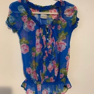 Abercrombie & Fitch. Sheer floral top. Ruffle hem/sleeves